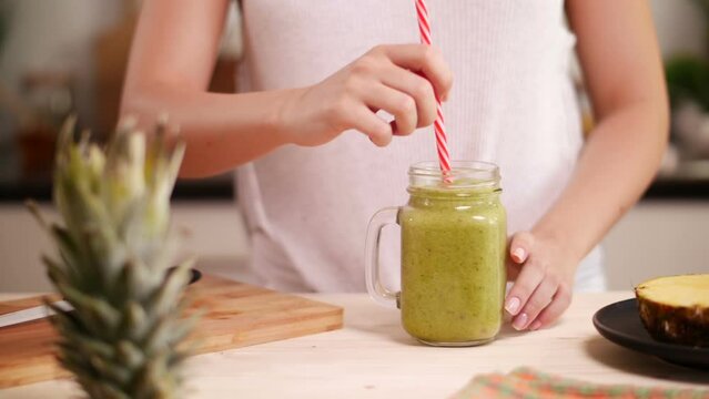 Healthy green smoothie in the jar for breakfast