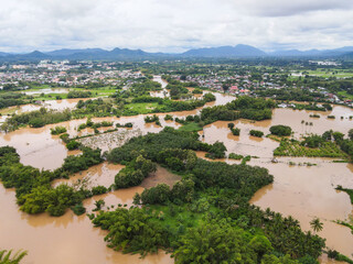 Aerial view river flood village countryside Asia and forest tree, Top view river with water flood...