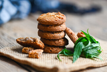delicious sweet dessert cookie with hemp leaf plant THC CBD herbs food snack and medical, Cannabis...