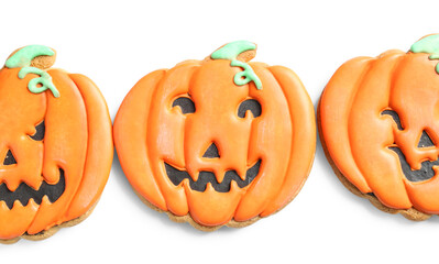 Halloween pumpkin cookies on white background