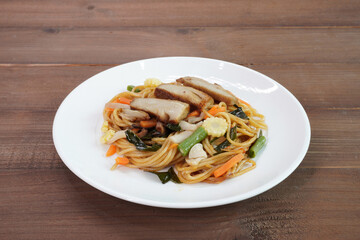 Spaghetti. Thai style spicy vegetarian spaghetti (Pad Khee Mao or Drunken stir fried). Vegetarian food. Vegetarian festival. Italian - Thai fusion food