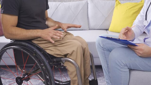 Disabled Person's Health, Man In Wheelchair Being Examined By Doctor.
The health of a disabled person, a man in a wheelchair, is examined by a doctor.

