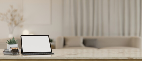 Digital tablet mockup and copy space on marble tabletop over blurred living room background