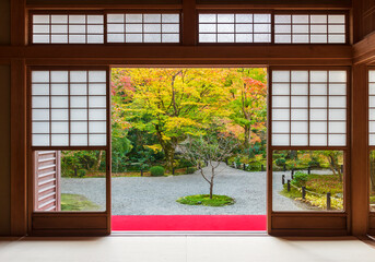 idyllic scenery of Japanese house with garden in Kyoto, Japan in autumn season