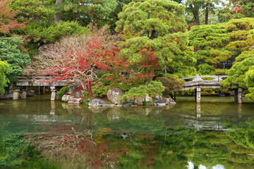 Fototapeta na wymiar Idyllic landscape of pond in Kyoto, Japan in autumn season