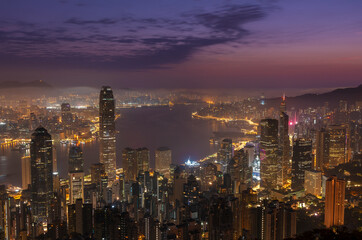 Fototapeta na wymiar Victoria harbor of Hong Kong city at dawn