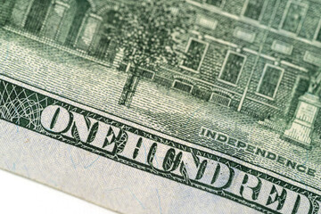 Close-up elements of dollar bills. Money, US dollar bills background. Paper money is scattered on the table. Photo for finance and economy concepts.