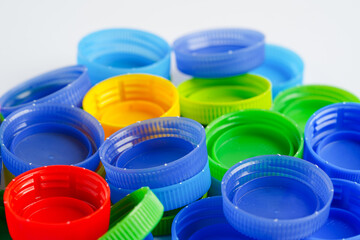 Plastic bottle caps colorful for recycle on white background.