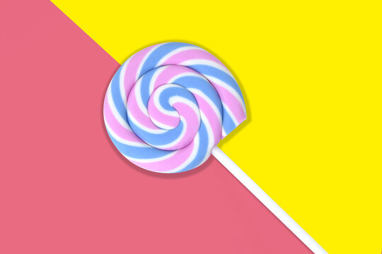 Colorful Lollipop On Pink And Yellow Backgroun