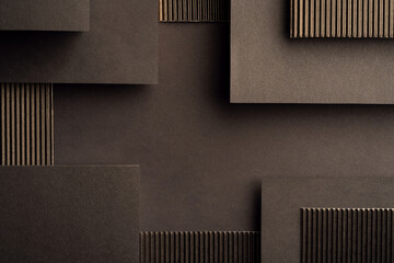 geometric black background made of corrugated cardboard and paper