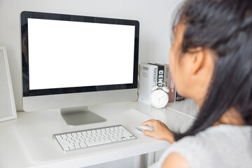 Close-up office worker Asian woman typing on keyboard computer white screen at home office. Concept of technology, connection, communication. Clipping path on white screen isolated