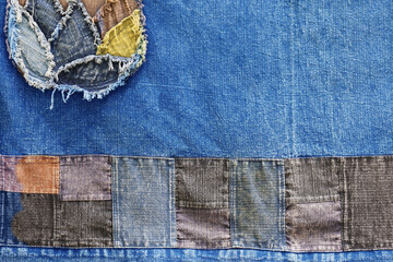 Ripped denim patch and destroyed torn denim blue scraps. Double color denim jeans fashion abstract background - obrazy, fototapety, plakaty