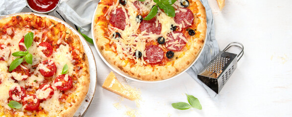 Freshly baked pizza on dark background.