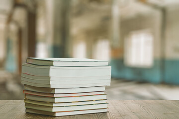 books on wooden table