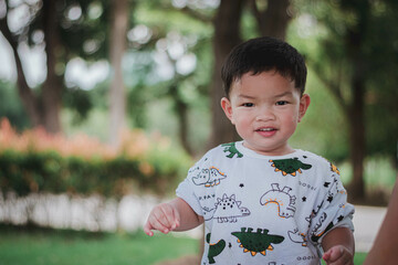 Cute boy with parents in Holiday 