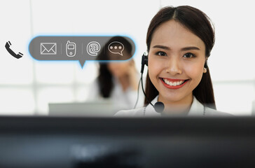 Beautiful happy call center smiling asian businesswoman operator customer support phone services...
