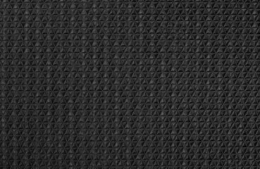 Black rubber texture background with seamless pattern.