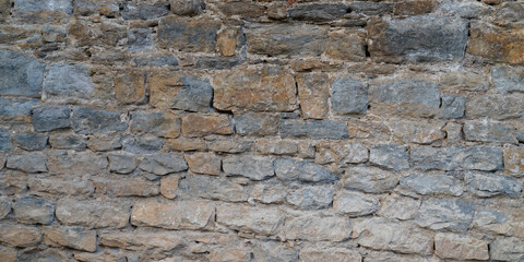 ancient medieaval stones facade on old vintage house