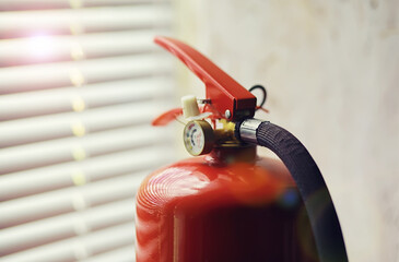 Fire extinguisher has hand engineer inspection checking pressure gauges to prepare fire equipment...