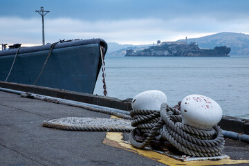 Alcatraz across San Francisco Bay from San Francisco past vessel bow