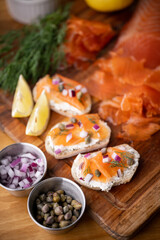 sliced cured salmon on bread with cream cheese