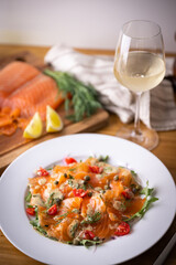 sliced and smoked salmon salada with white wine