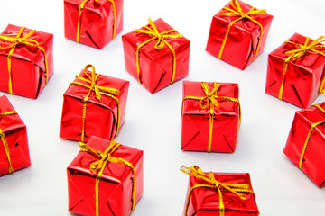 Red gift boxes on white background. Christmas decoration.