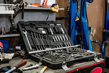 Large workbench with tools at station for vehicle technical servicing