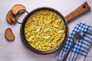 Paella with vegetables and chicken. Typical Spanish tapas recipe.