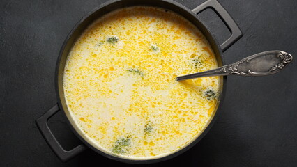 Creamy fish soup with salmon, potatoes, onions , carrots, dill and broccoli in a pot. Kalakeitto- traditional dish of the Finnish cuisine. Healthy