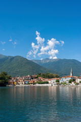 Fototapeta premium View over Lake Mergozzo to the village of Mergozzo. Province of Piedmont in Northern Italy.
