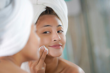 Woman Cleansing Skin With Micellar Water And Cotton Pad While Making Daily Beauty Routine.