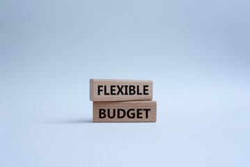 Flexible budget symbol. Concept words Flexible budget on wooden blocks. Beautiful white background. Business and Flexible budget concept. Copy space.