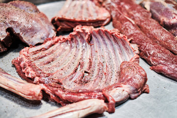 Butchered sheep. Preparing meat for smoking or barbecue