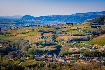 View on Crozes-Hemritage small village, the Rhone Valley vineyards and the Ardeche mountains from the Mejeans belvedere (Drome, France)