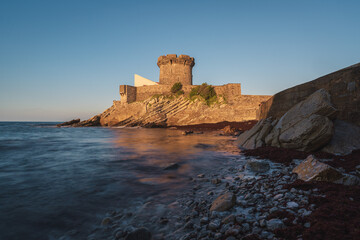 Fort de Socoa at sunset, with unique flysch landform in Ciboure and Saint-Jean-de-Luz