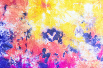Fototapeta na wymiar tie dye pattern hand dyed on cotton fabric abstract background.
