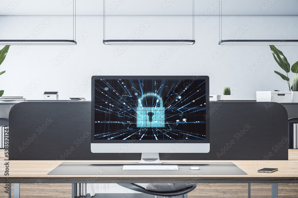 Poster close up of coworking office workplace with computer monitor and abstract glowing padlock on screen,