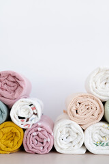 Fototapeta premium Colourful multicolored handmade towels on a white background