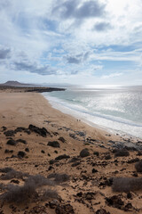 Hiking in La Graciosa Island, Canary Islands. View of the virgin beaches.