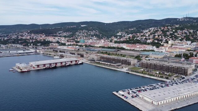 Scenic aerial footage of Trieste, Italy. Fascinating aerial views of city, coastline, port and cruise ship.
