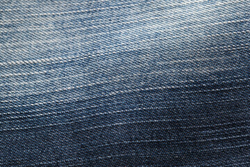 Blue denim, background. Stylish jeans, macro, design