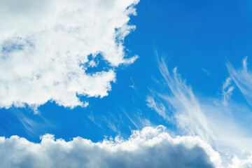 Clouds passing the blue sky