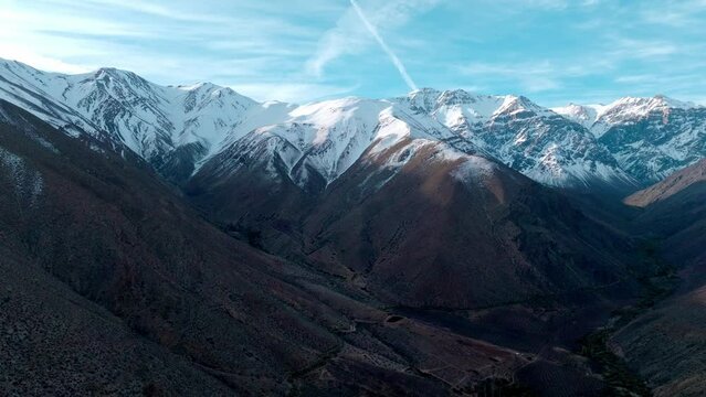 Panoramic aerial view of the snow-capped Andes Mountains, northern Chile.