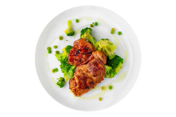 Steak with chicken or turkey with vegetables. Balanced, nutritious, tasty and nutritious food. Ready-made menu for a restaurant or for delivery. Dish in a white plate isolated on a white background.
