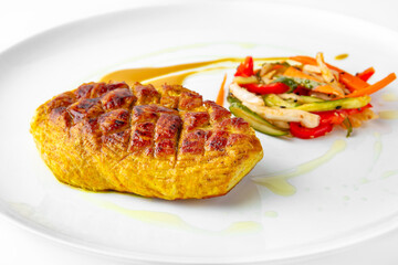 Steak with chicken or turkey with vegetables. Balanced, nutritious, tasty and nutritious food. Ready-made menu for a restaurant or for delivery. Dish in a white plate isolated on a white background.