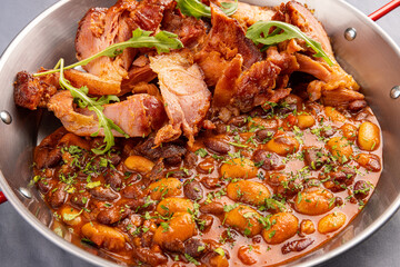 Beans stew with smoked pork leg