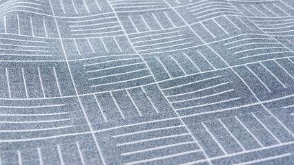 Estampado de lineas en cuadrícula blanca sobre fondo gris