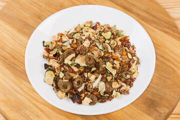 Mixture of spices and dried vegetables on the white dish