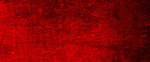 Red grunge texture background of cement plaster wall with cracks, red grunge wall texture. dark red grunge background. Horror Cement texture, wall full of scratches, Scary dark wall, grungy cement. 
